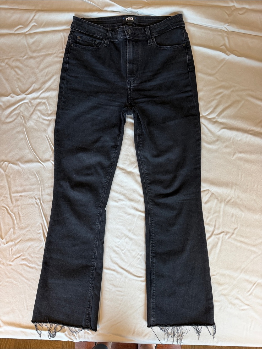 PAIGE Black Flare Jeans with Frayed Hem